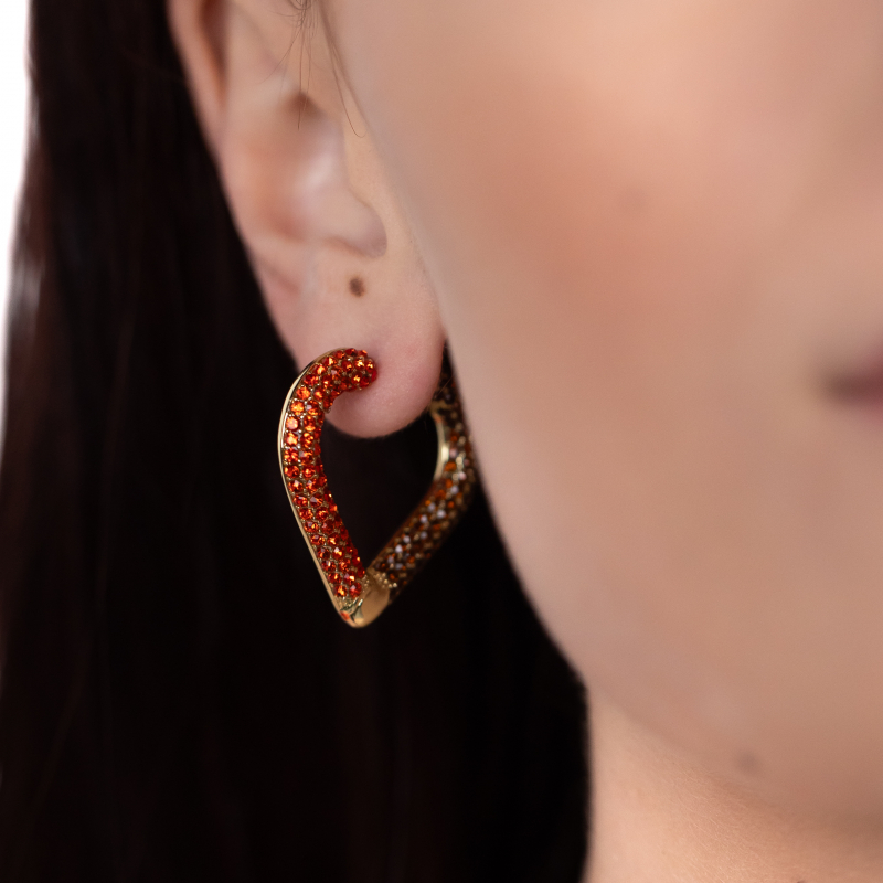 Gold earrings with an inner part in orange-brown