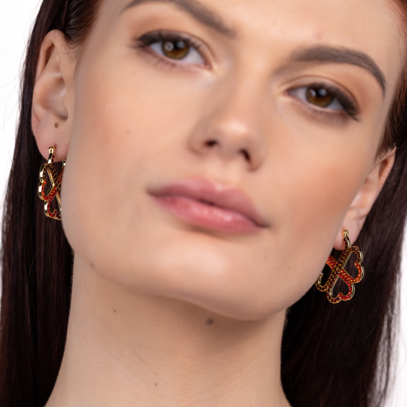 Earrings with four-leaf clovers in love gold
