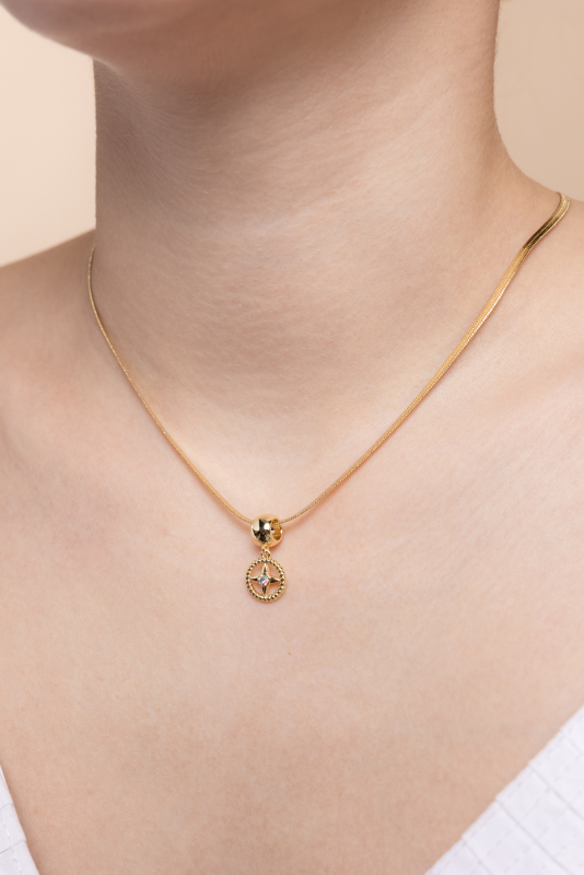 Arany bevonatú lánc Stabilitás medállal